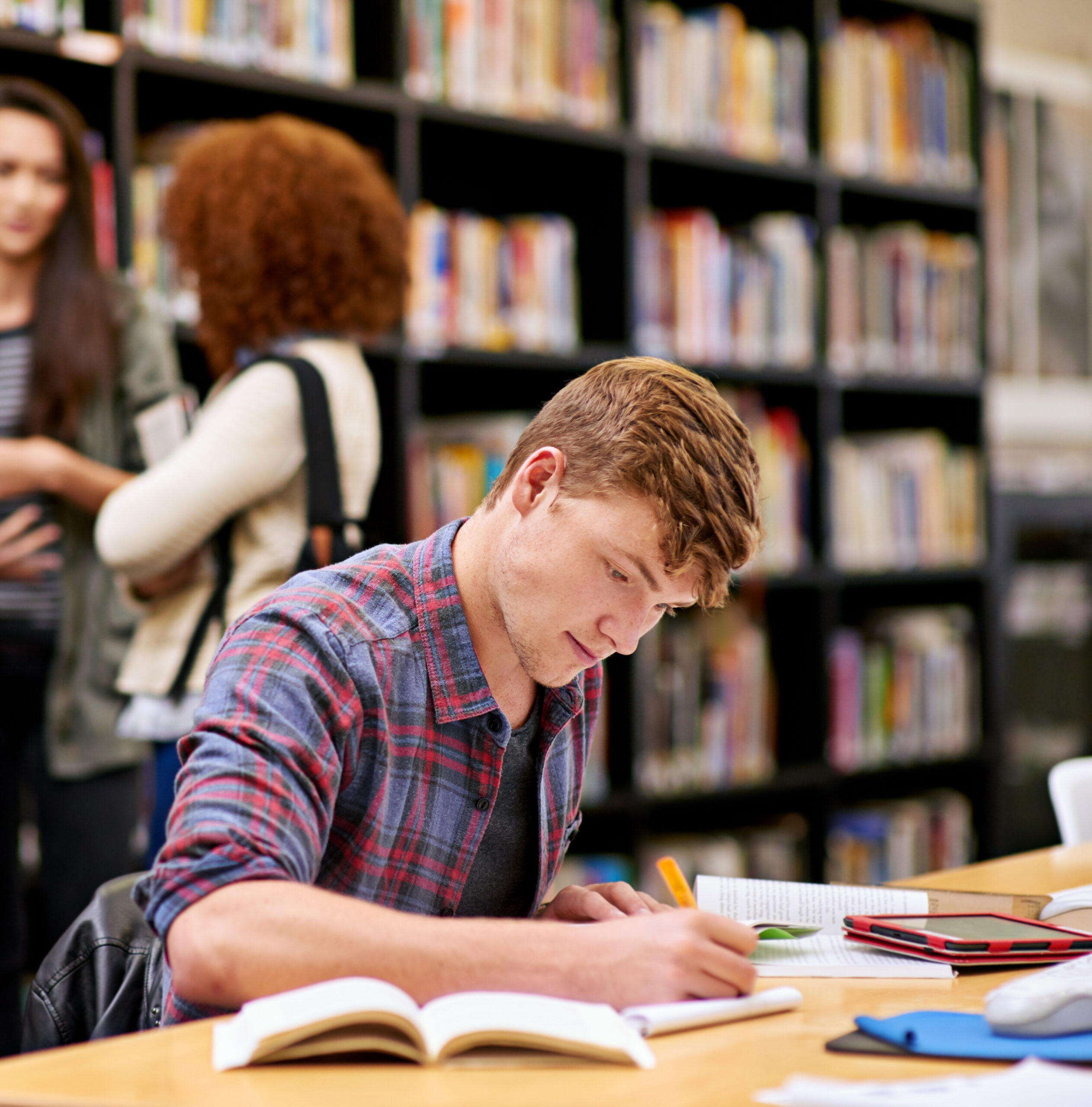 Student,,Writing,And,Notebook,In,Library,For,Study,,Education,And